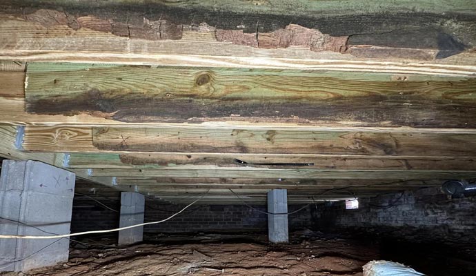 Damaged crawl space girder