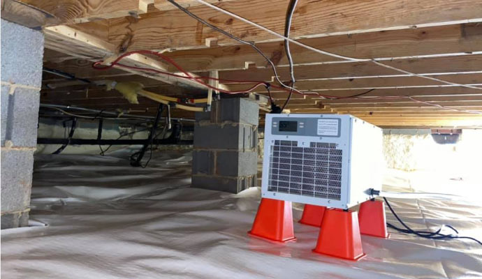 Installed dehumidification system in crawl space